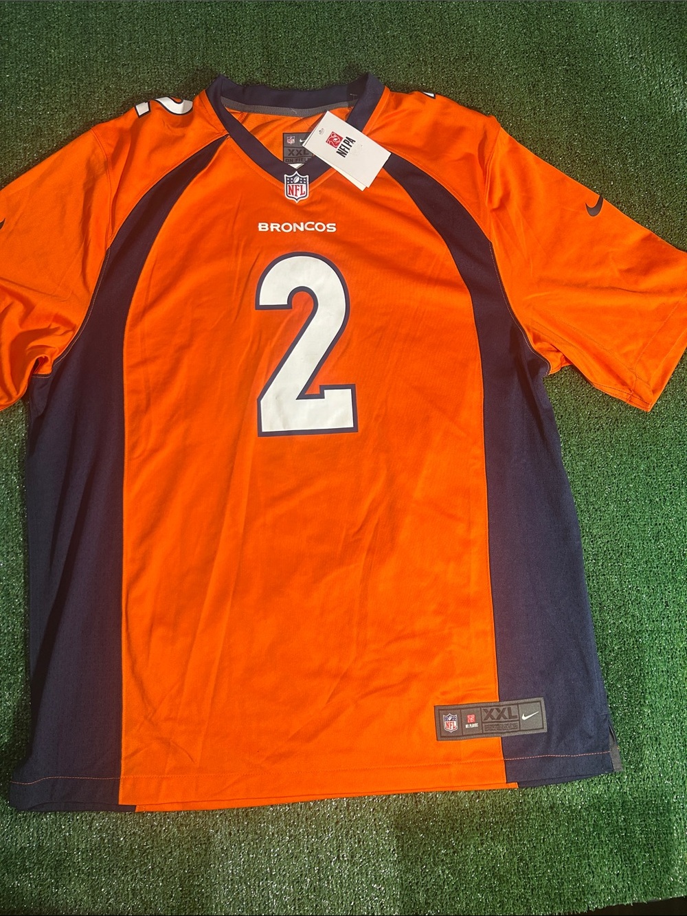 Nike Broncos Men’s Orange and Navy Patrick Surtain II On Field Football Jersey.